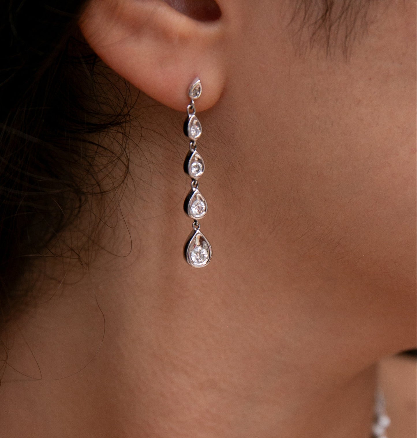 Contemporary Graduated Pear Motif Diamond Earrings in 14kt White Gold