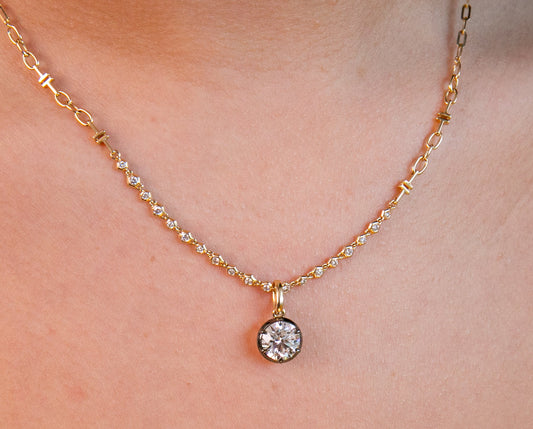 Antique Style Diamond Pendant on Signature Diamond and Gold Chain